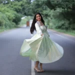 Mint Green Flared Silk Blend Anarkali Gown with Embroidered Sheer Illusion Neckline