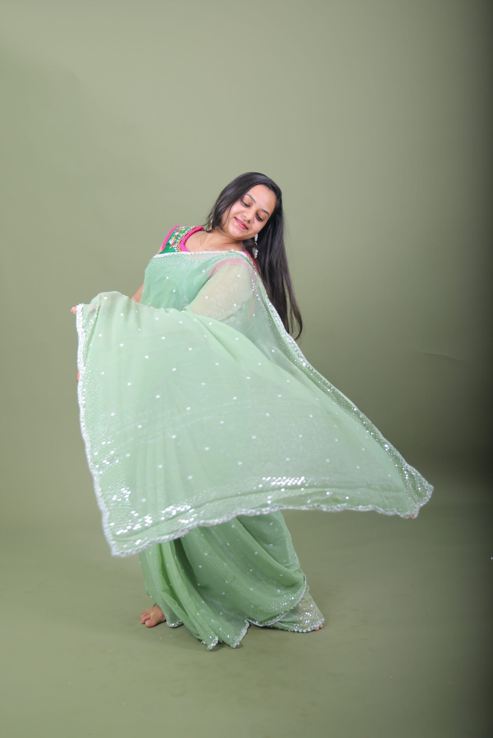 Copy of 0L9A5952 Mint Green Shimmer Organza Saree with Silver Sequin Bootis & Scallop Border - Image 1