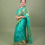 Turquoise Organza Saree with Zari Border