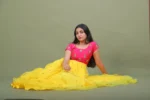 Mustard Yellow & Rani Pink Embroidered Layered Anarkali Gown with Sheer Flared Cape Overlay - Image 2